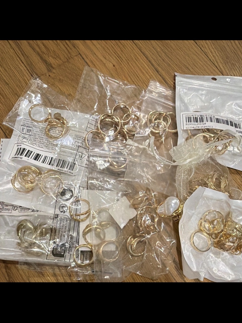 Set of 75+ Gold Tone Rings varying sizes